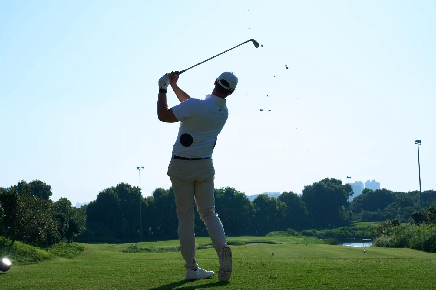 Golfer wearing Fairwind Motion through a swing